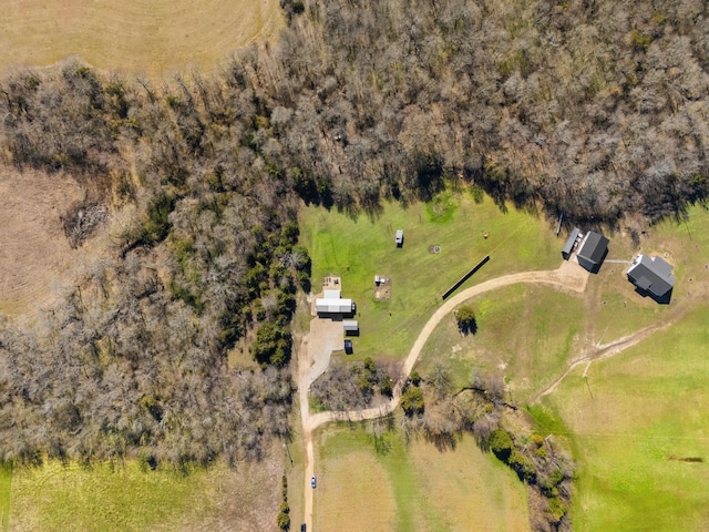 birds eye view of property with a rural view