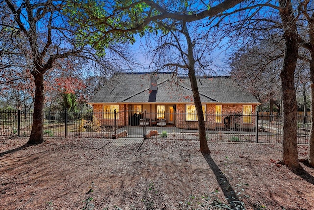 back of house with a patio