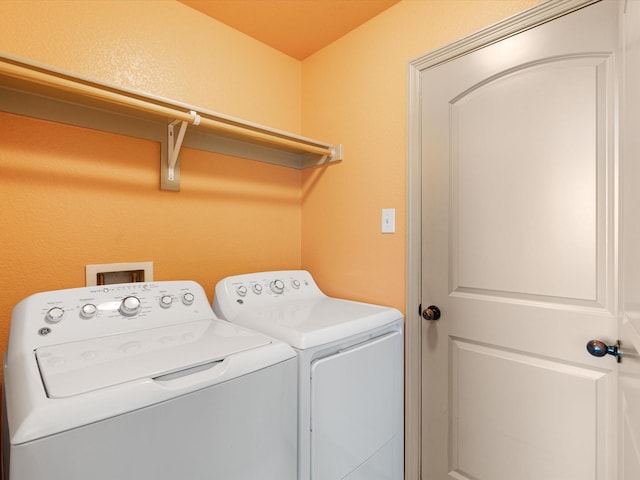 laundry area featuring washing machine and dryer