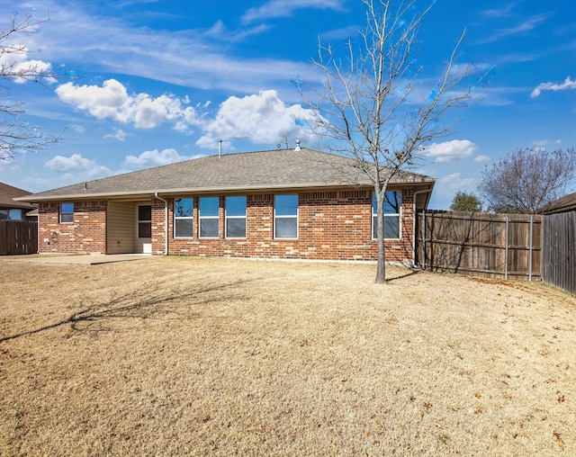 back of house with a patio