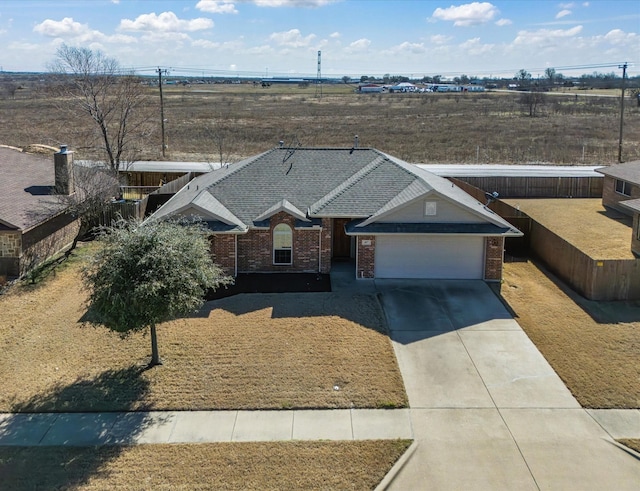 ranch-style home with a garage