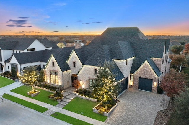 view of front of house with a lawn