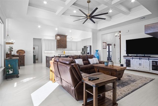 living room featuring beamed ceiling, ornamental molding, coffered ceiling, and a high ceiling