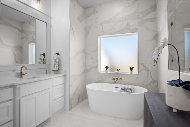 bathroom featuring vanity and a bathtub