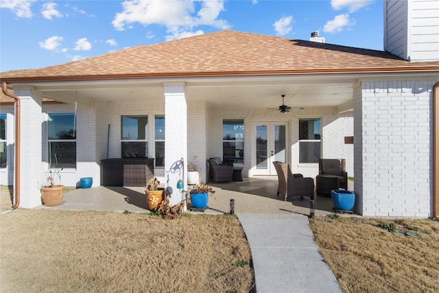 back of property featuring an outdoor hangout area, a patio area, and ceiling fan