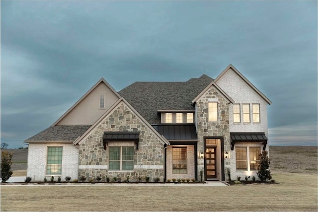 view of front of home with a front yard