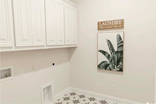 laundry area featuring cabinets, electric dryer hookup, hookup for a washing machine, and hookup for a gas dryer