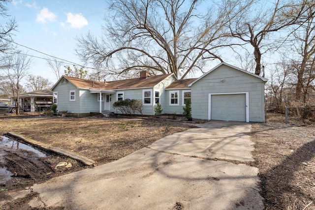 ranch-style home with a garage