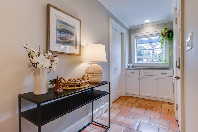 doorway featuring crown molding