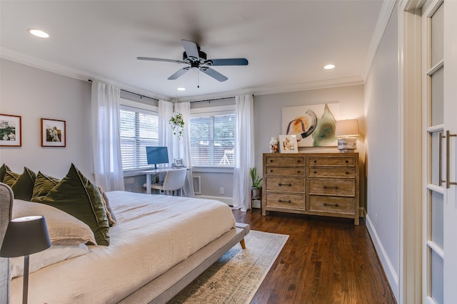 bedroom featuring ornamental molding, dark wood-type flooring, and ceiling fan