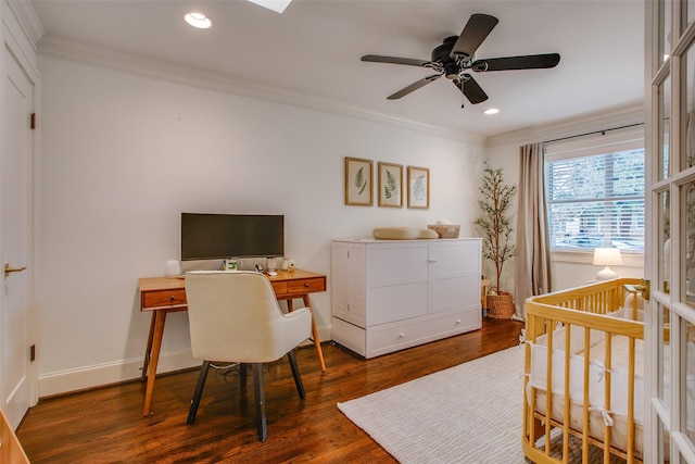 bedroom featuring dark hardwood / wood-style flooring, crown molding, a nursery area, and ceiling fan