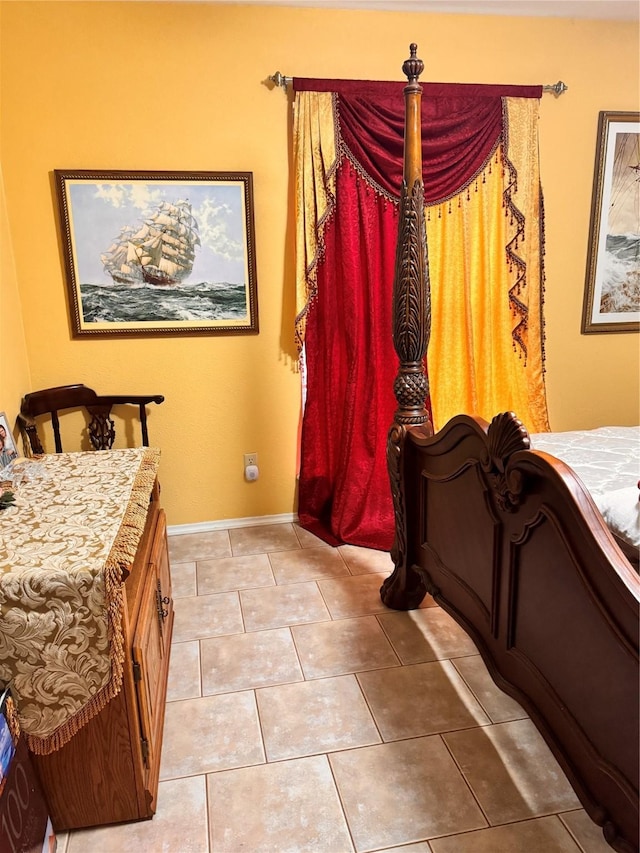 bedroom featuring light tile patterned floors