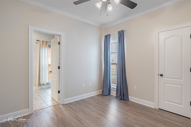 unfurnished bedroom with ornamental molding, ensuite bathroom, ceiling fan, and light hardwood / wood-style flooring