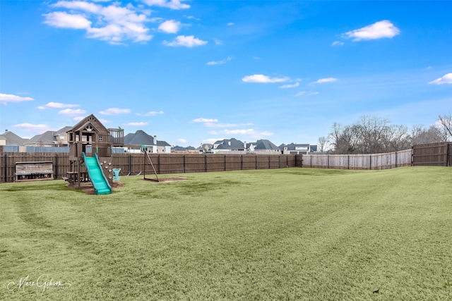 view of yard with a playground