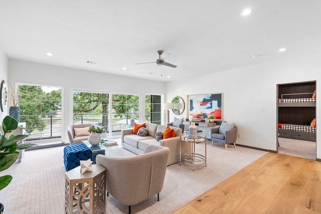 living room with ceiling fan