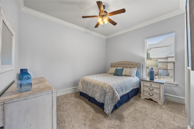 bedroom featuring crown molding, light colored carpet, and ceiling fan