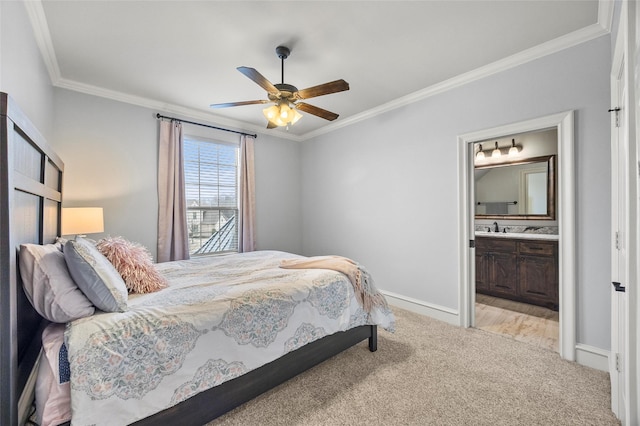 bedroom featuring sink, ensuite bath, ceiling fan, ornamental molding, and light carpet