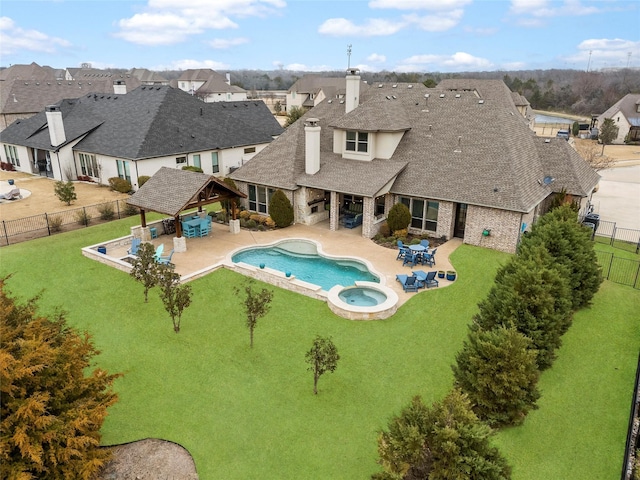 909 Reflection Ct, Heath, TX 75032 - view of swimming pool with a fenced backyard, a residential view, a pool with connected hot tub, and a patio area