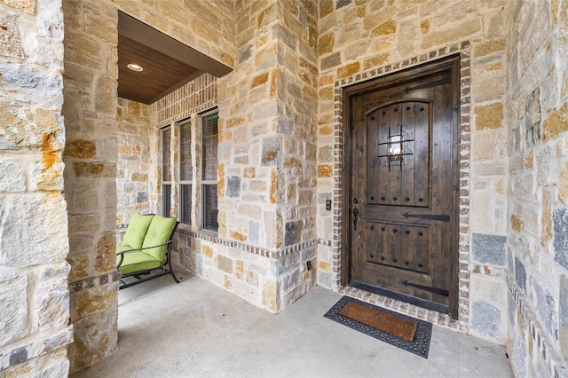909 Reflection Ct, Heath, TX 75032 - property entrance featuring stone siding