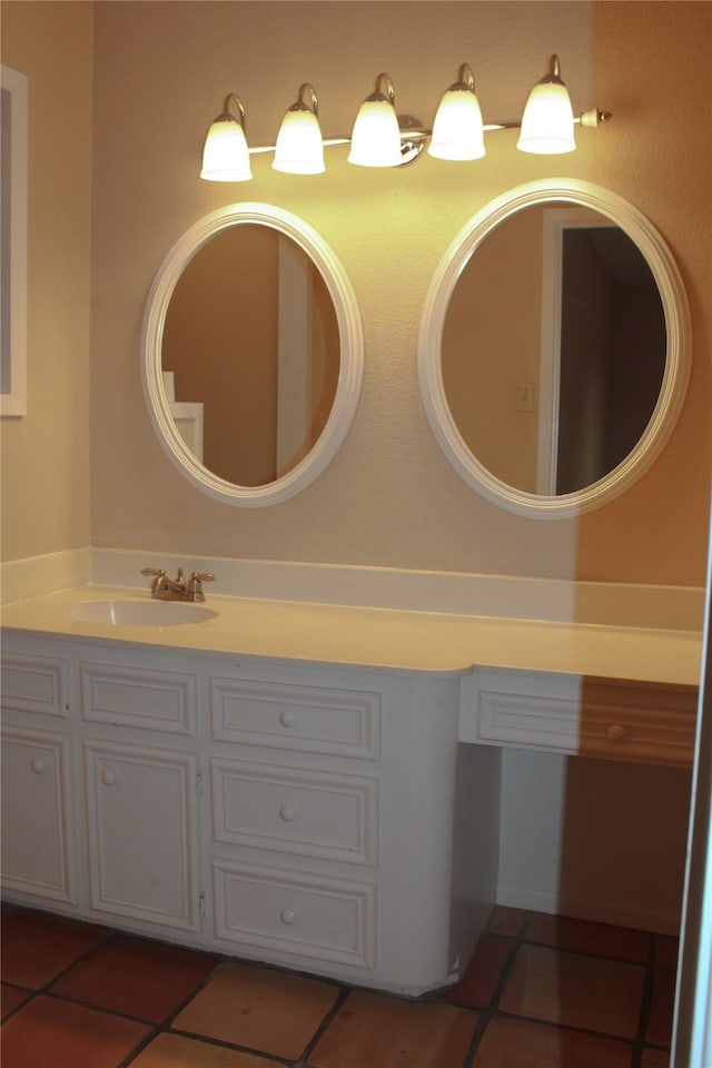 bathroom with vanity and tile patterned floors