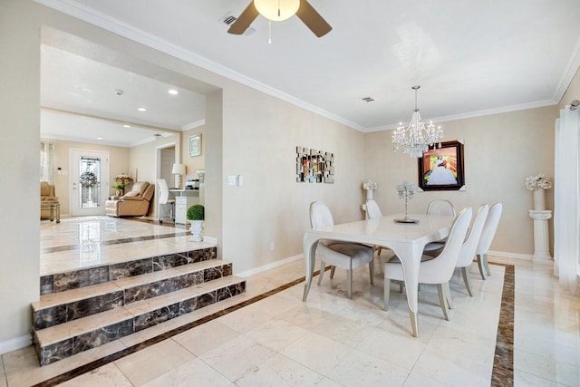 dining area with ceiling fan with notable chandelier and ornamental molding