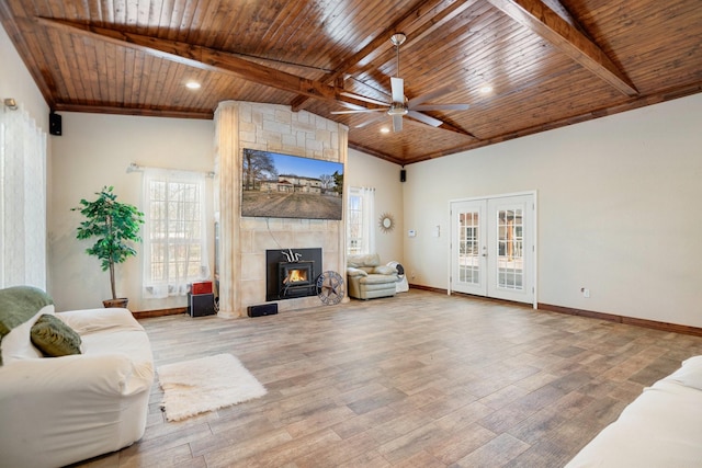 living room with french doors, wood ceiling, wood-type flooring, lofted ceiling with beams, and ceiling fan