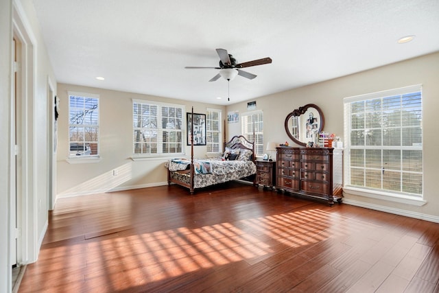 bedroom featuring hardwood / wood-style floors and ceiling fan