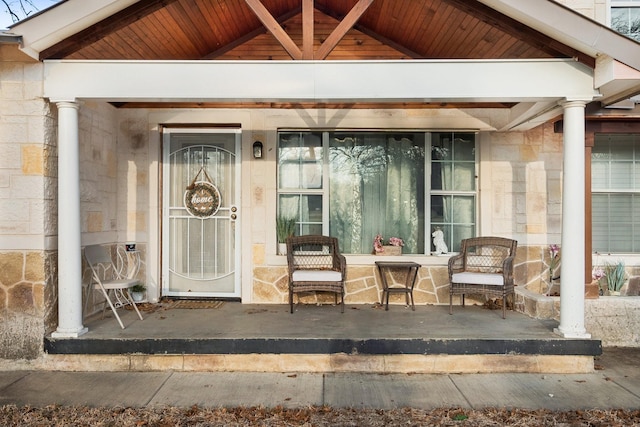 doorway to property with covered porch