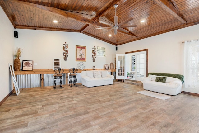 unfurnished living room with lofted ceiling with beams, wooden ceiling, french doors, and light wood-type flooring