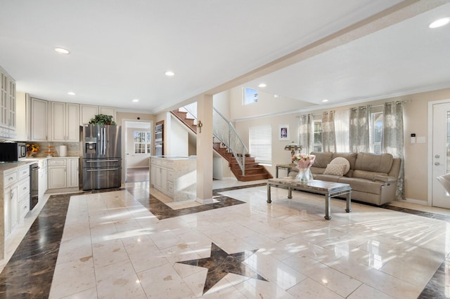 living room featuring ornamental molding