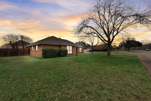 exterior space with a yard