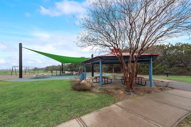 view of playground with a yard and a gazebo