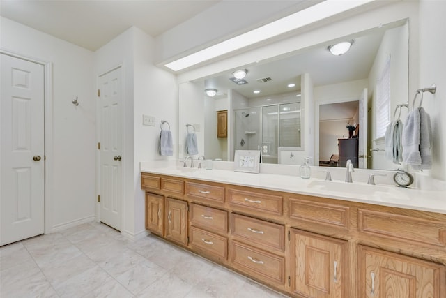 bathroom with vanity and walk in shower