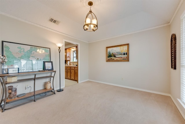 interior space featuring crown molding, sink, and light colored carpet