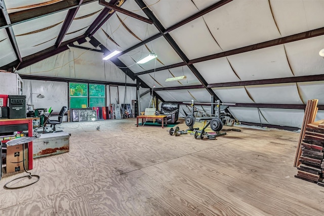 misc room with lofted ceiling