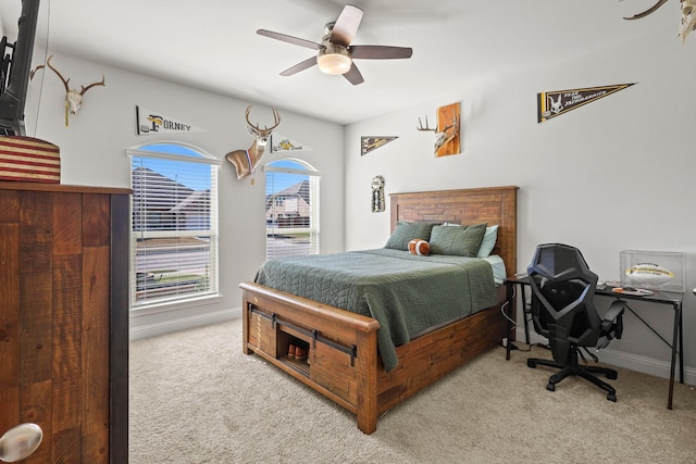 carpeted bedroom featuring ceiling fan