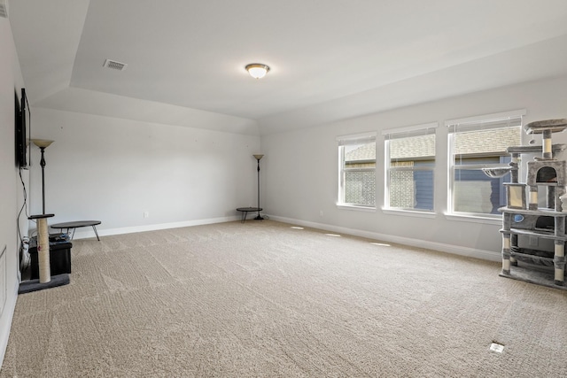 unfurnished living room featuring carpet flooring