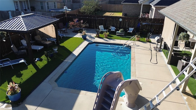 view of pool with a gazebo and a patio area