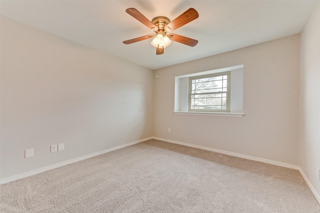 unfurnished room with carpet floors and ceiling fan