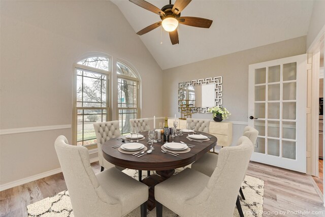 unfurnished living room with a brick fireplace, ornamental molding, light hardwood / wood-style floors, and ceiling fan