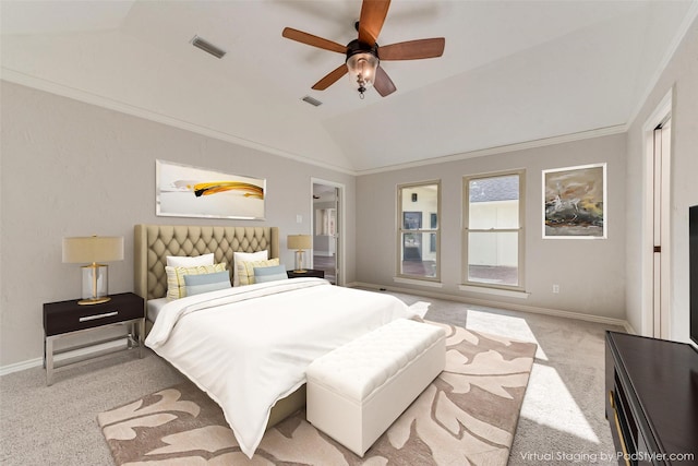 bedroom with vaulted ceiling, ornamental molding, light colored carpet, and ceiling fan