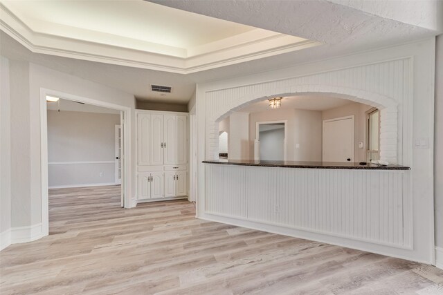 spare room featuring ceiling fan, high vaulted ceiling, and light hardwood / wood-style flooring