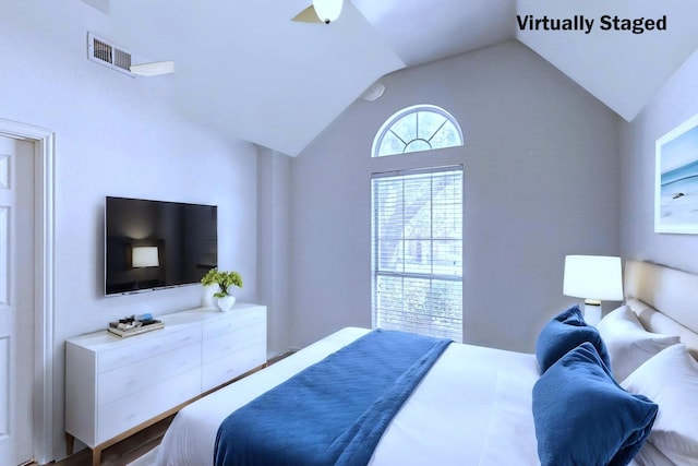 bedroom featuring lofted ceiling