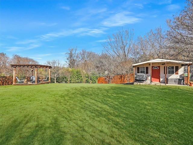 view of yard with a pergola