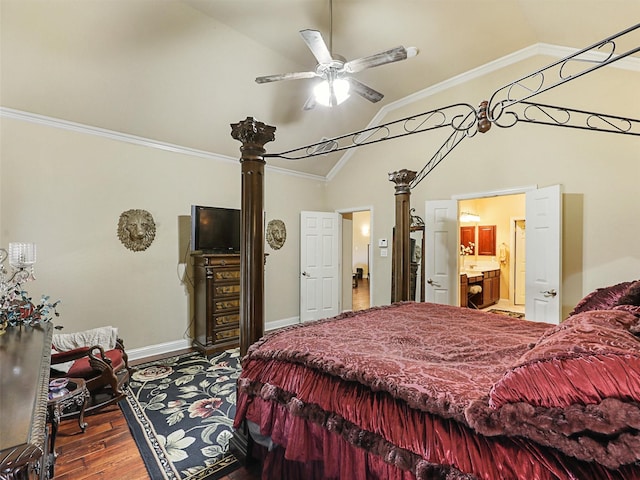 bedroom with lofted ceiling, crown molding, ensuite bath, hardwood / wood-style flooring, and ceiling fan