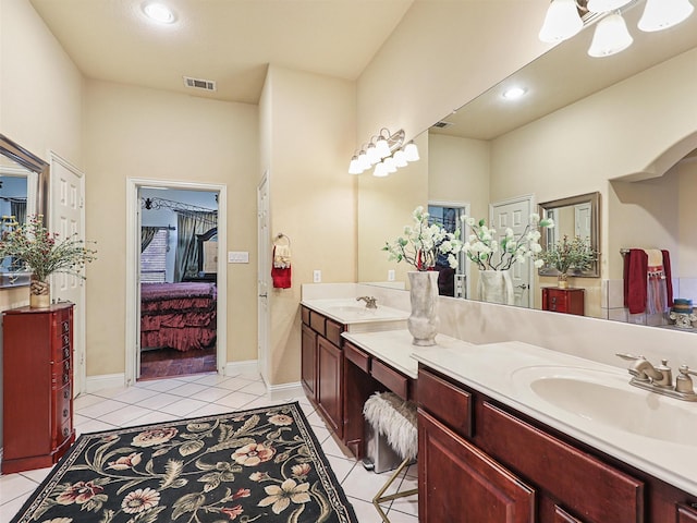 bathroom featuring vanity and tile patterned flooring