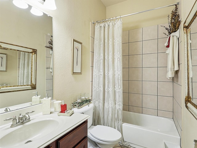 full bathroom with vanity, toilet, and shower / bath combo with shower curtain