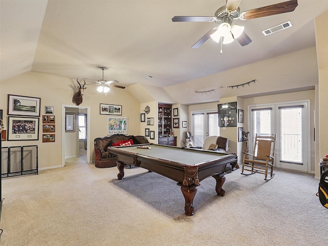 game room featuring vaulted ceiling, light colored carpet, ceiling fan, and billiards