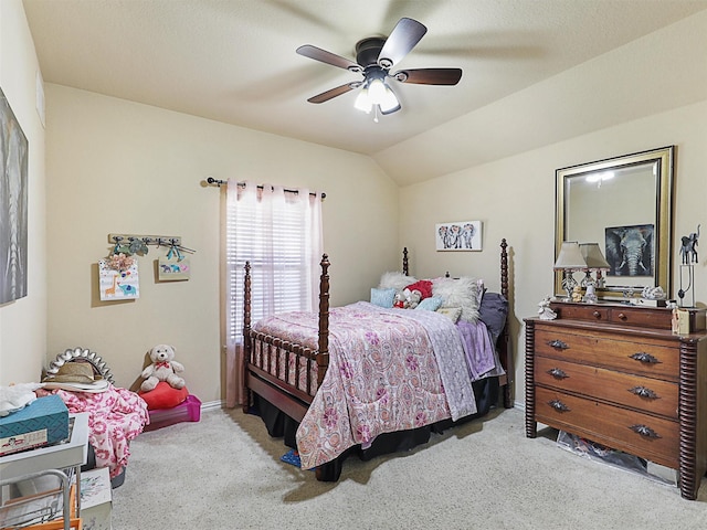 carpeted bedroom with lofted ceiling and ceiling fan