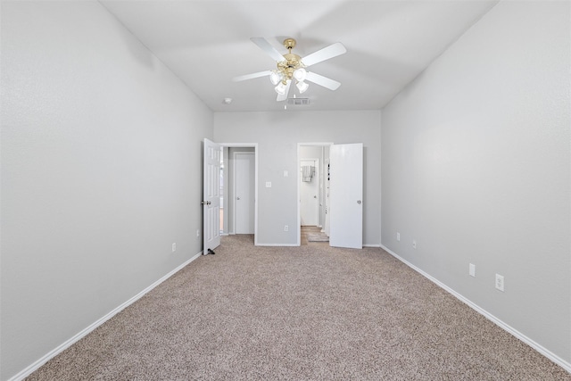 unfurnished bedroom featuring ceiling fan and carpet flooring